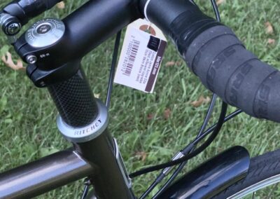 A close up of the handlebar of a bicycle.
